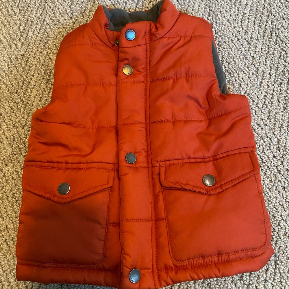 24 mos orange puffer vest